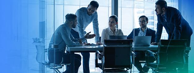 Team collaborating in a bright meeting room